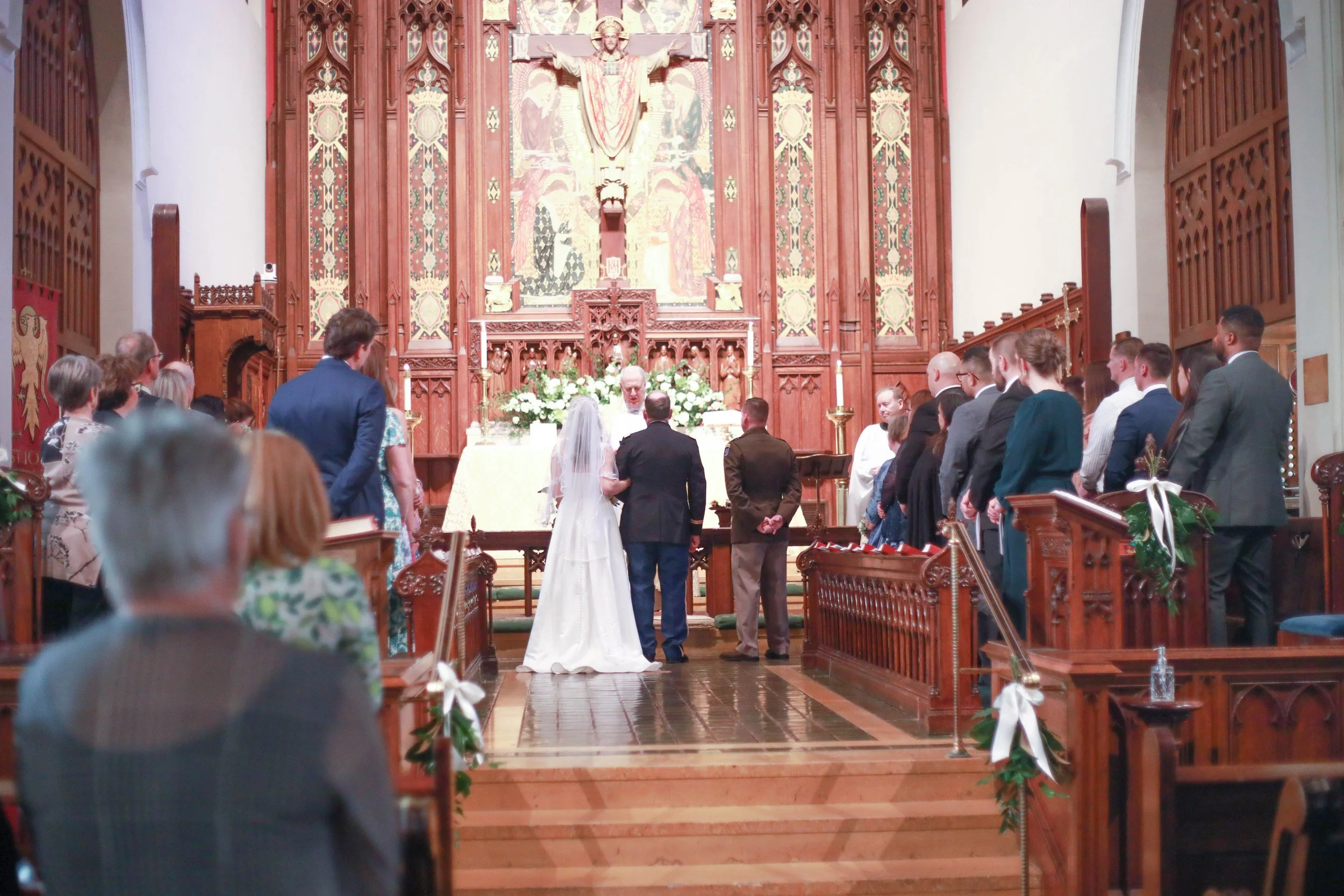 Bride and groom during their wedding ceremony inside St. John’s Church in Savannah, Georgia