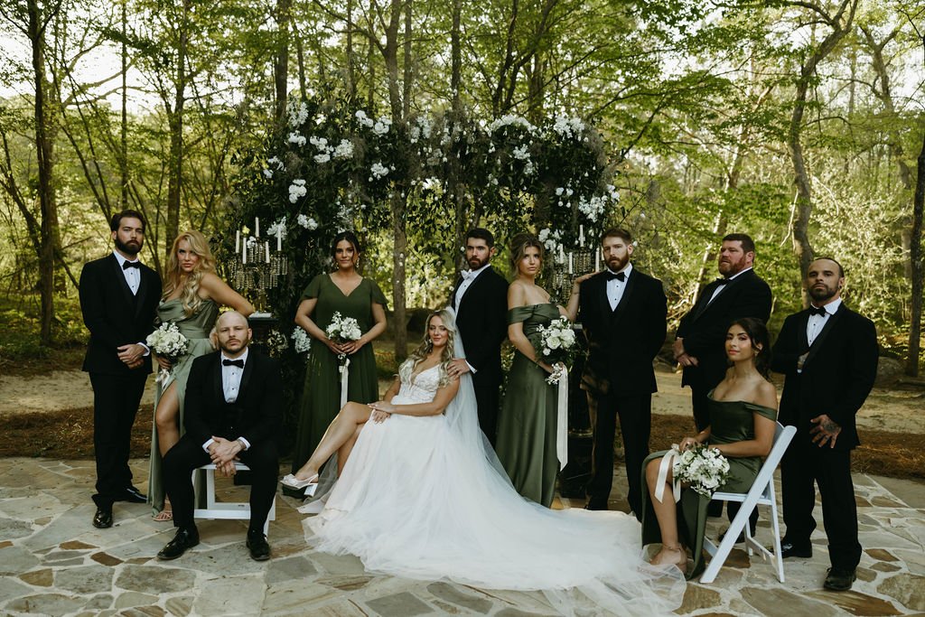 Stylized wedding party portrait with cinematic, old-world energy at an Atlanta wedding designed by Port Town Collective.”