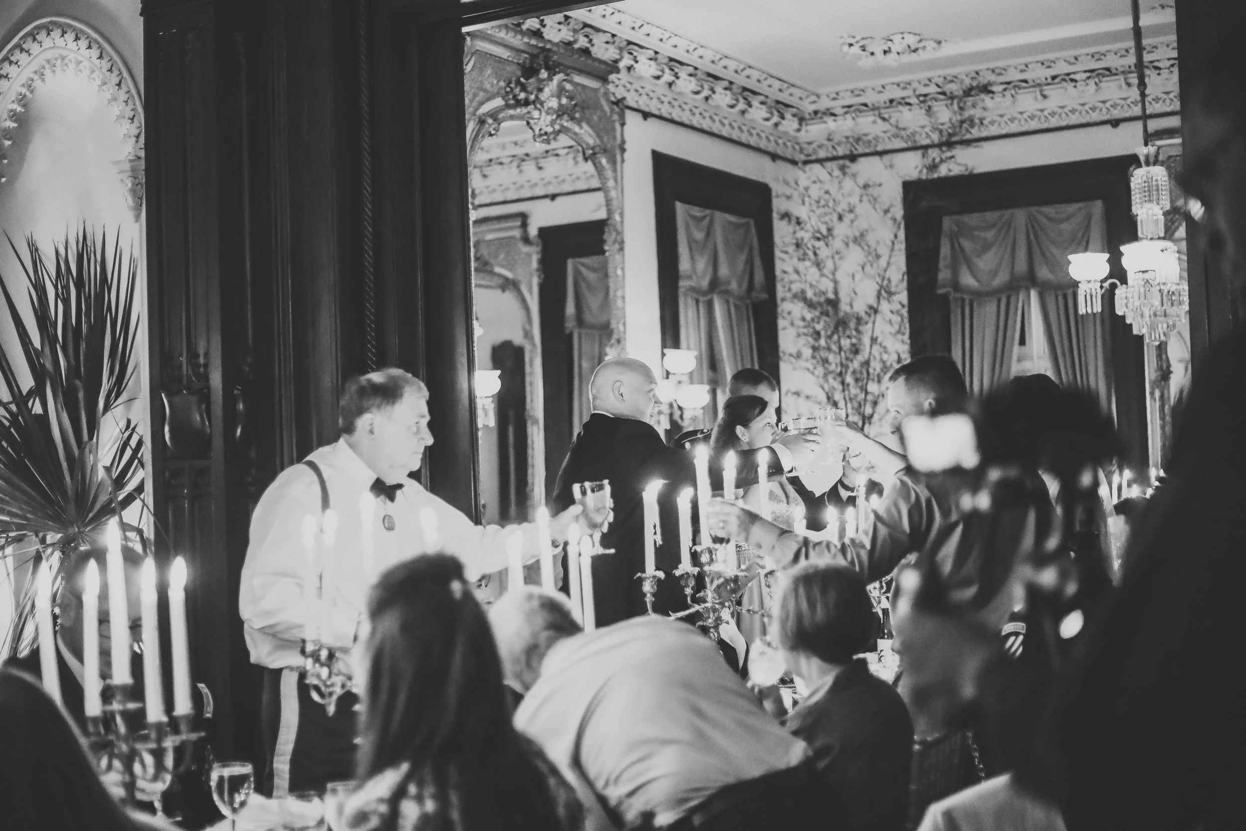 Guests gathered for a candlelit reception dinner inside the Green-Meldrim House in Savannah, Georgia.