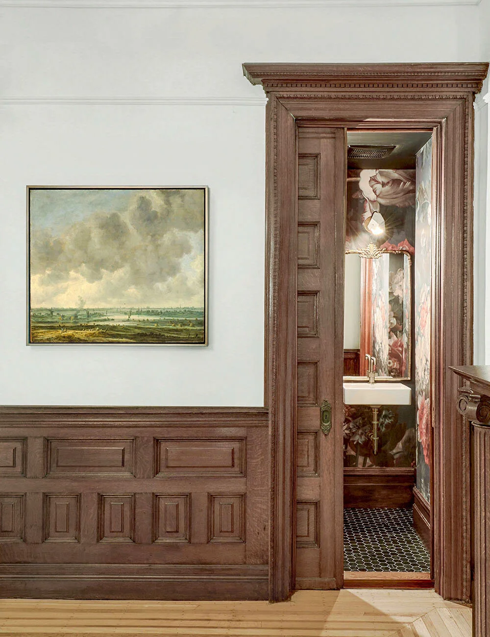 A powder room was inserted at the parlor level in a very discreet way