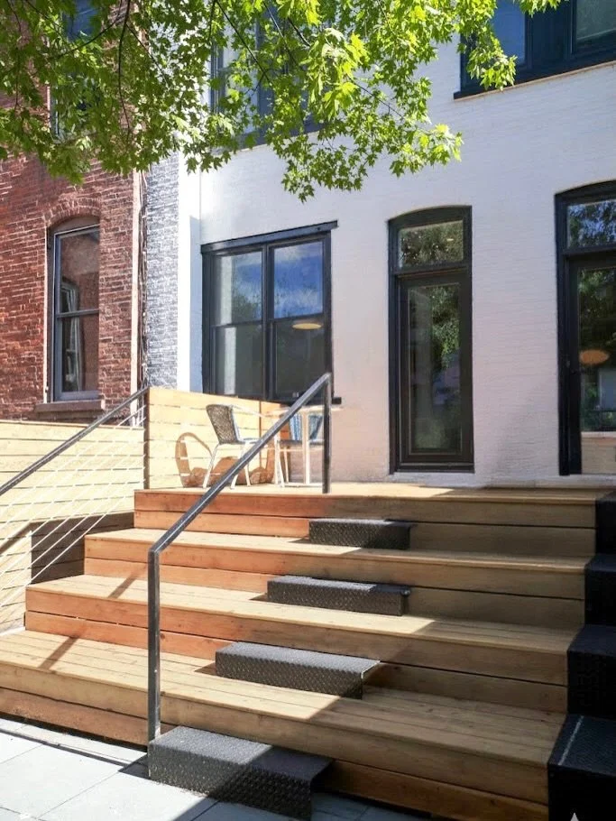 From neglected to reimagined.

This Brooklyn townhouse backyard once had a crumbling fa&ccedil;ade and a tight landing. We redesigned it with a custom, multi-level deck that adds seating, circulation, and a true extension of the interior&mdash;simple