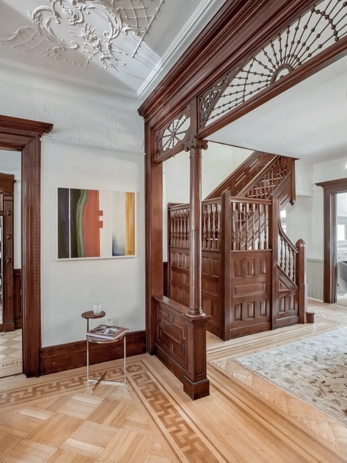 From the archive: an 1899 neo-Renaissance brownstone in Prospect Lefferts Gardens.

We restored the fretwork screen, paneled stair, ornamental plaster and Greek key parquet. Behind them, we strengthened the structure, significantly enhanced the perfo