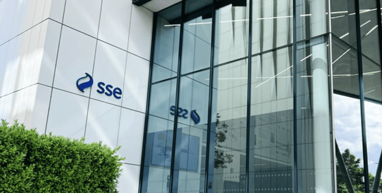 Modern office building with glass walls and the SSE logo on the exterior.