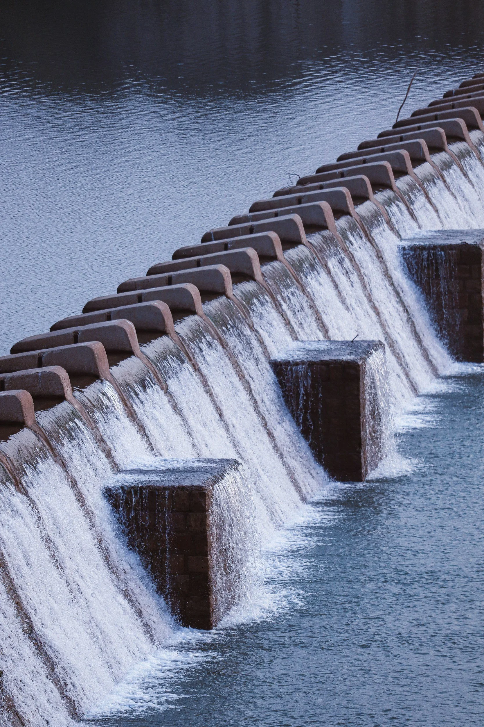 Up close photo of river dam.