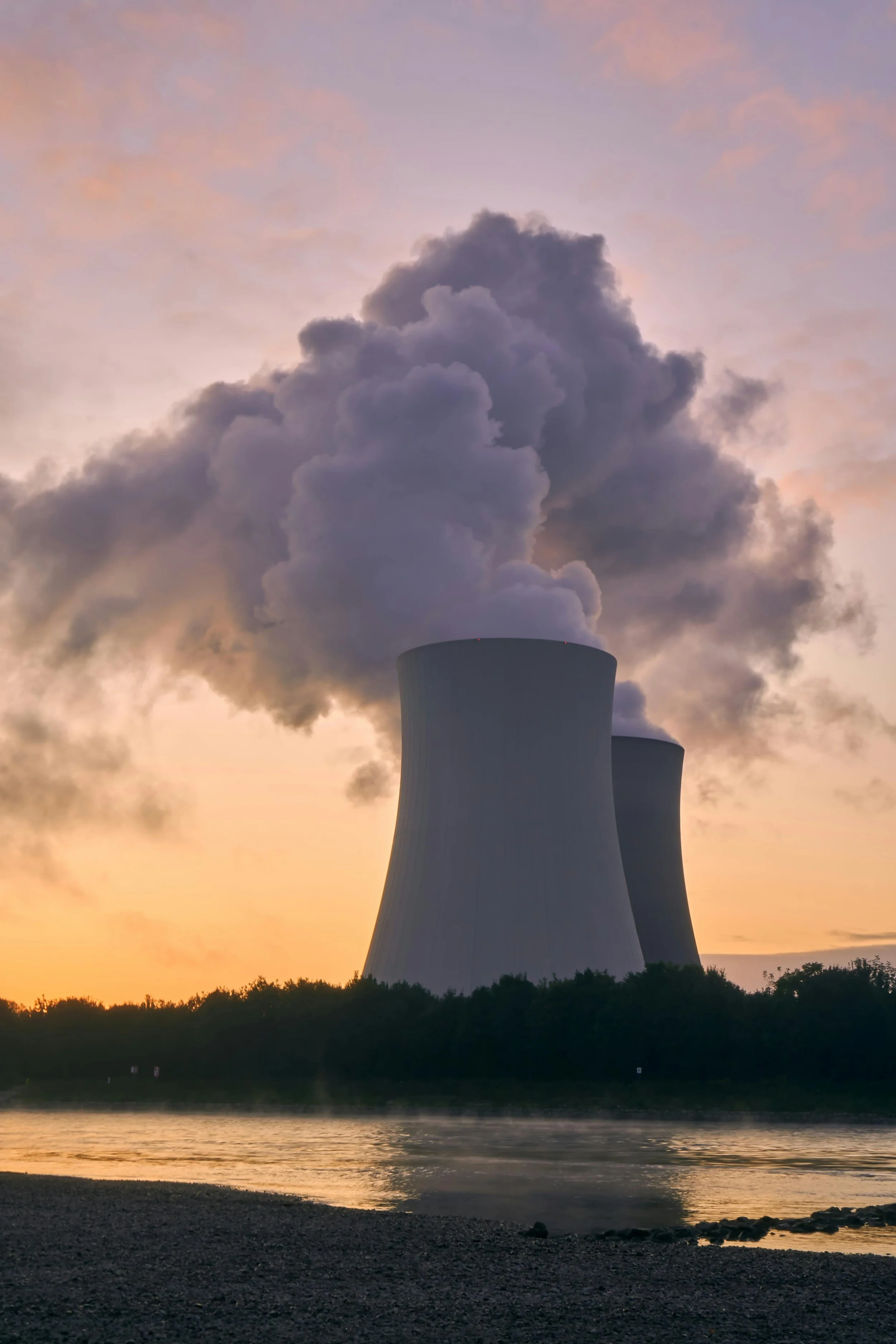 A nuclear power plant releases gases into the air.
