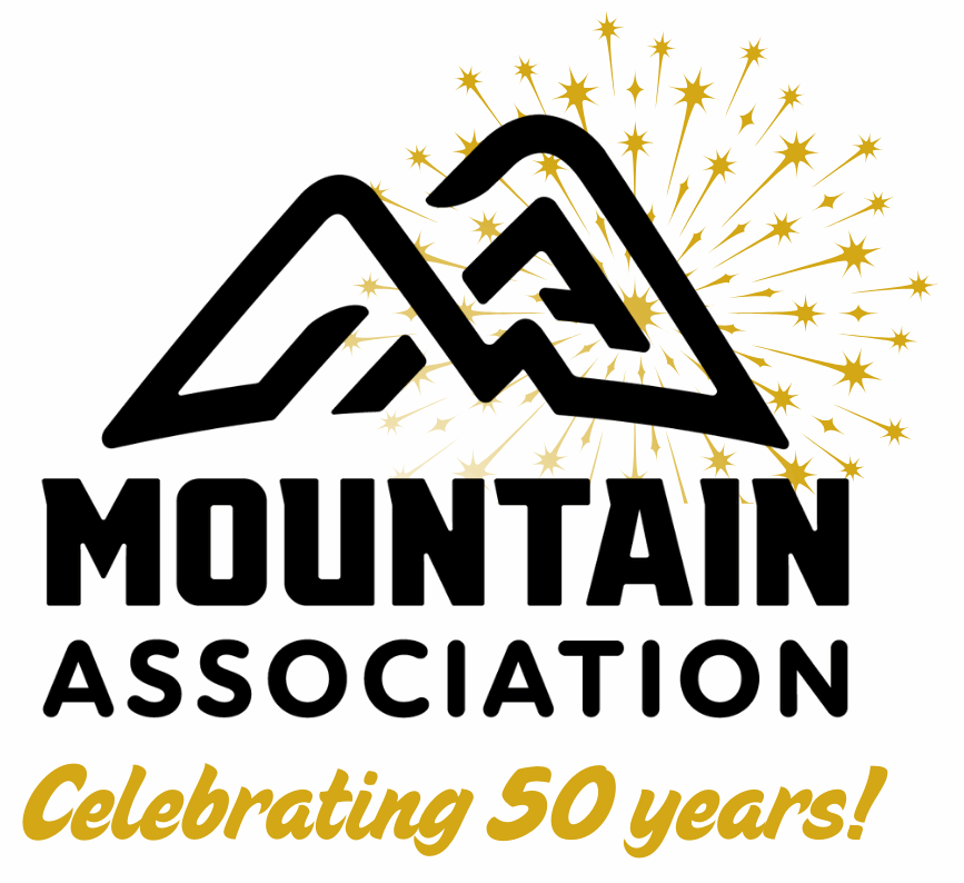 Black and gold logo for the Mountain Association.