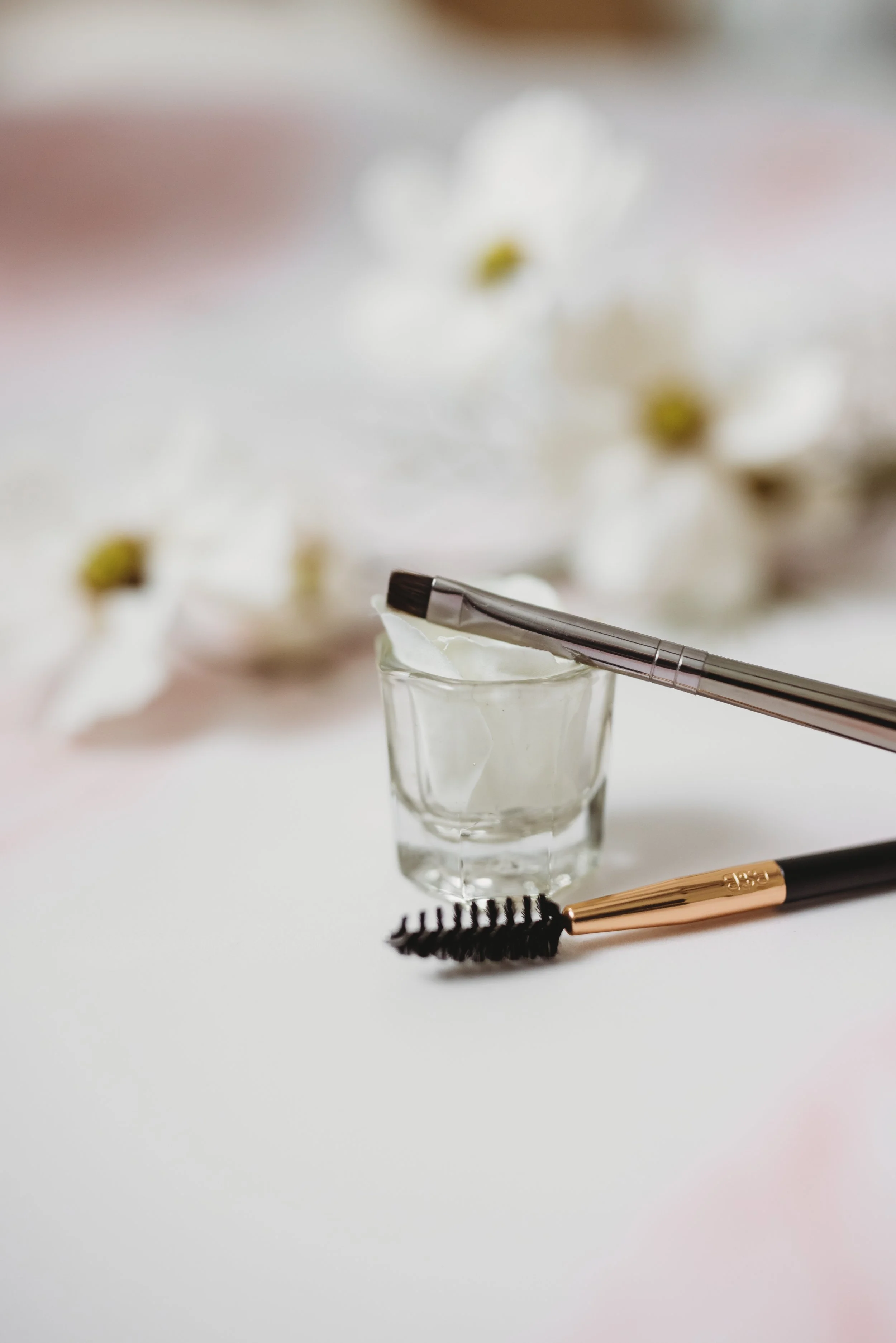 closeup of eye makeup tools, lash and brow services geneva, IL