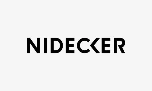 Le mot "NIDECKER" écrit en lettres noires sur un fond blanc.