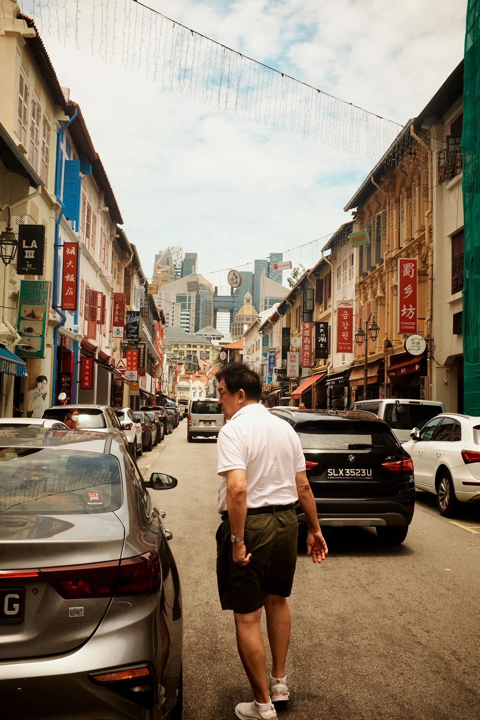 man on street in china town