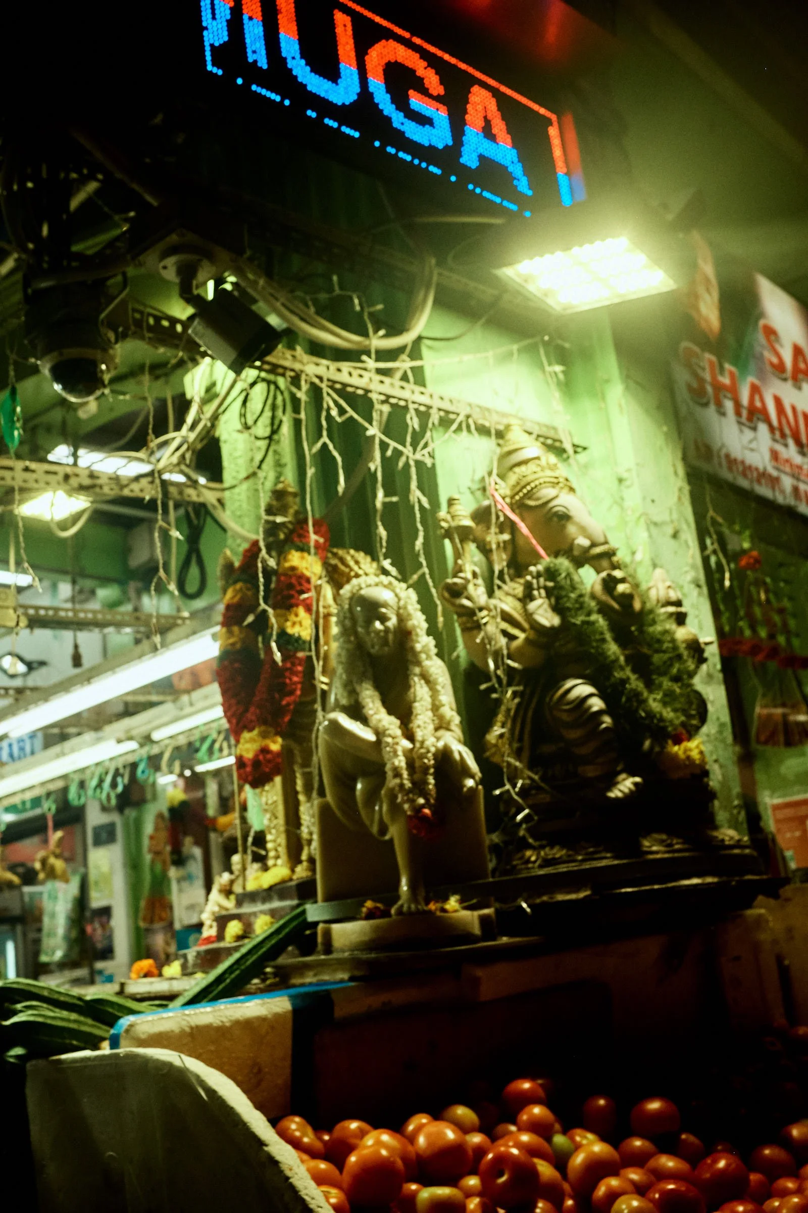 Market stand in little india at night