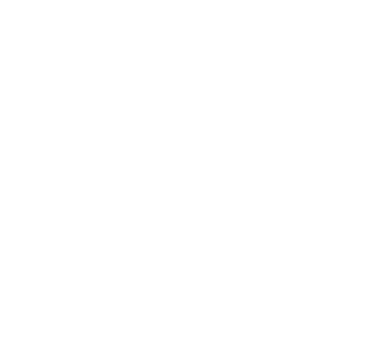 A person standing on top of a mountain during sunrise or sunset, overlooking the landscape.