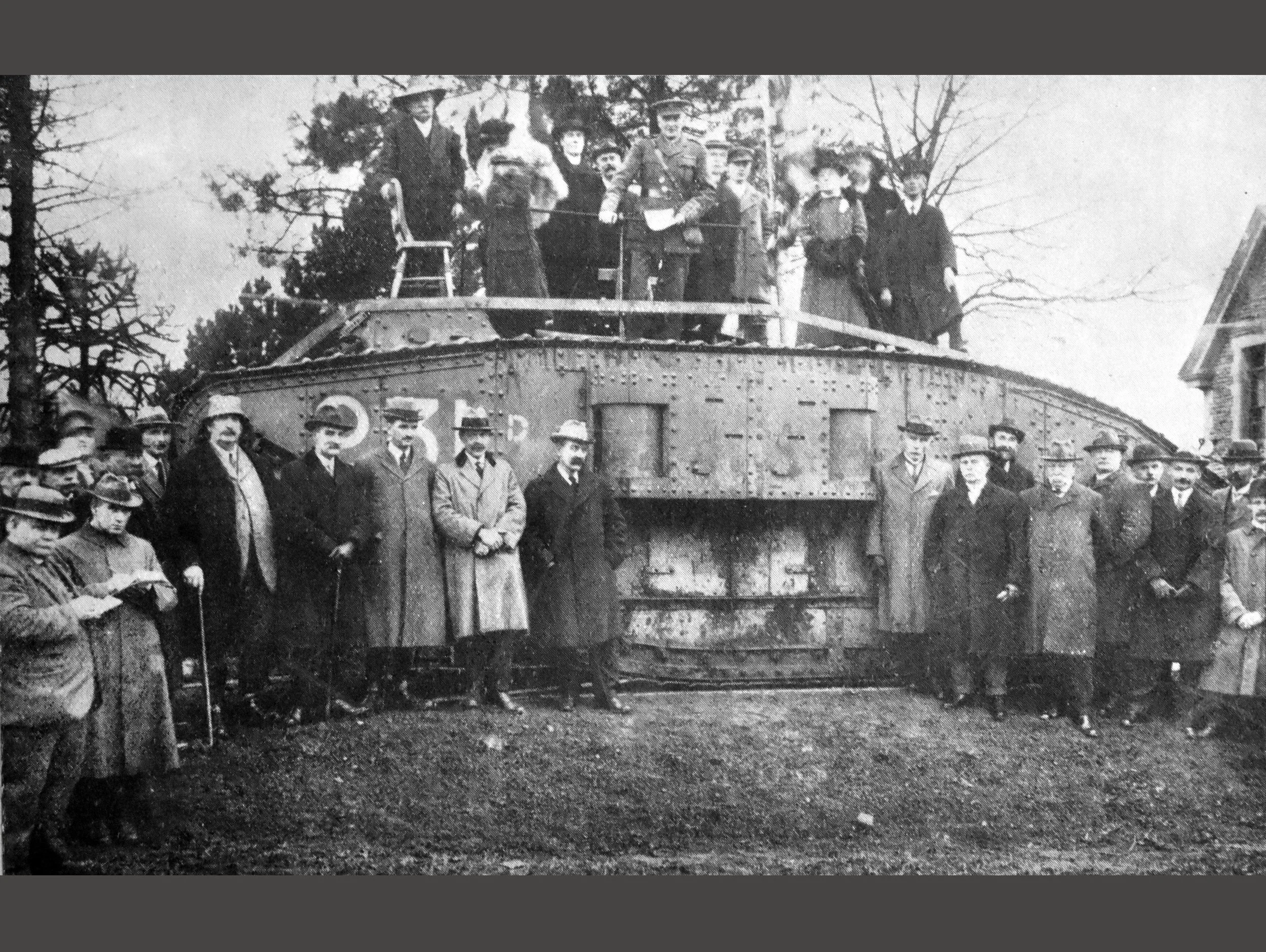  WW2 TANK -  
After WW2, a tank was presented to Frome for its great record in war savings. It was placed in the park and the photograph shows members of the Town Council, War Savings Committee and other town dignitaries.
