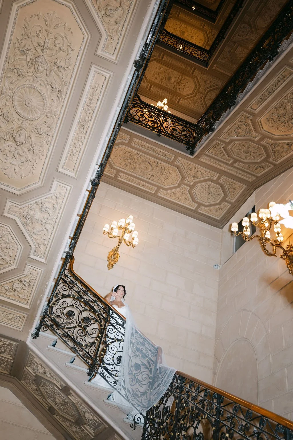 sarapaolucci-bride-potrait-on-master-stairs-of-st-regis-hotel.jpg
