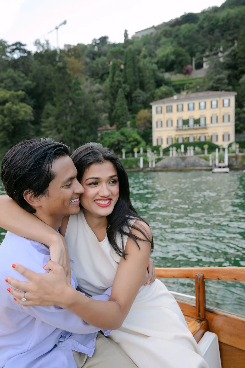 sarapaolucci-bride-and-groom-holding-each-other-lake-como.jpg