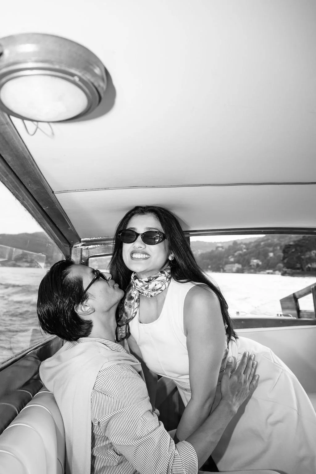 sarapaolucci-couple-portrait-taken-inside-a-boat-on-lake-como.jpg