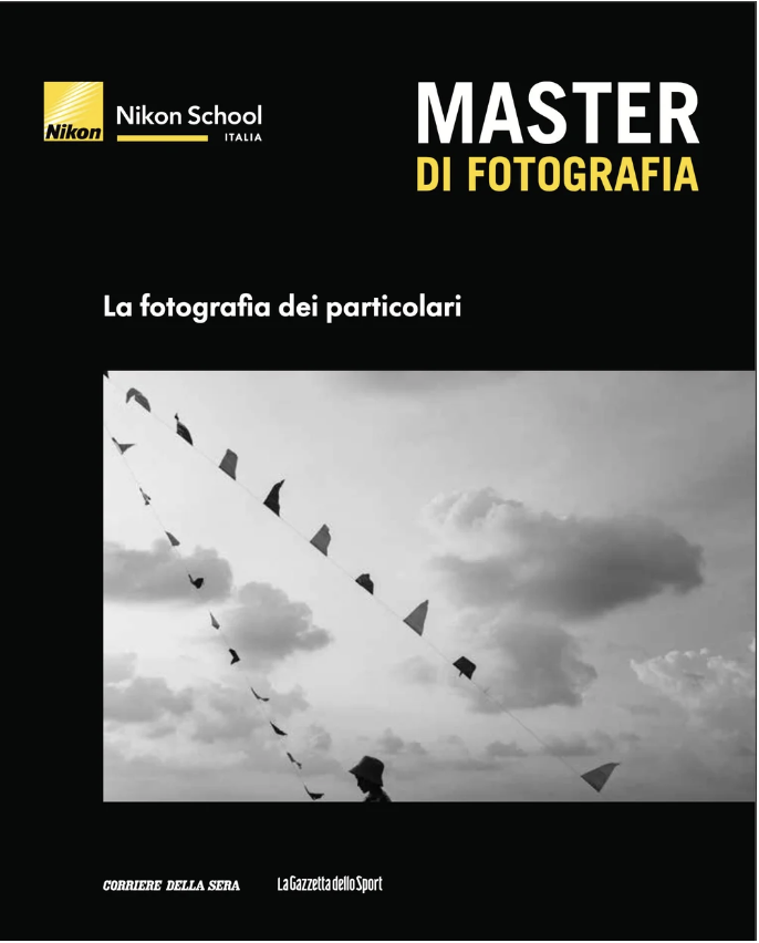 Cover of a Nikon School photography book titled 'Master di Fotografia' with a black and white photo of a person flying a kite in a cloudy sky.