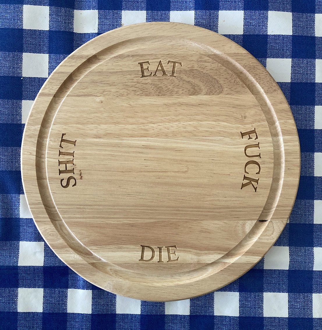 "Eat Shit Fuck Die" breadboard by Mark Perronet