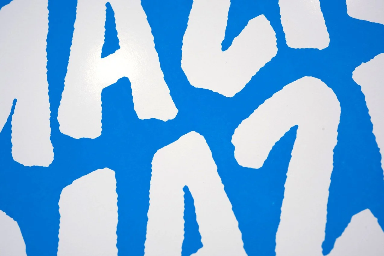 closeup of AMAZING stacked on blue background a pop-art screenprint by screeprinter Charlie Evaristo-Boyce