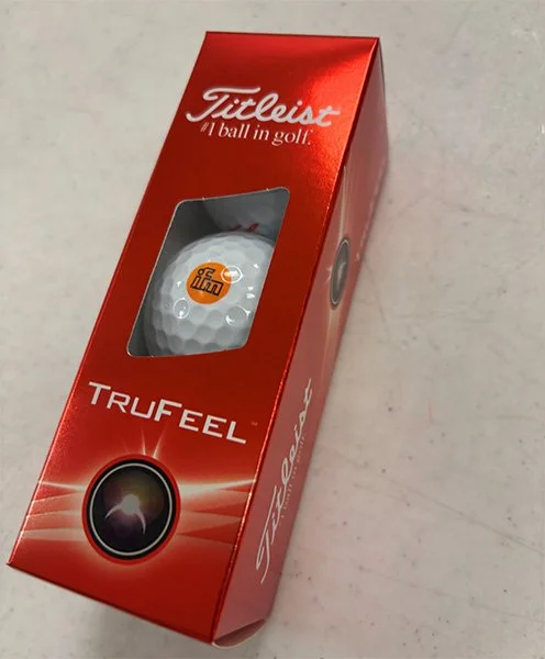 Sleeve of 3 Titleist golf balls with logo