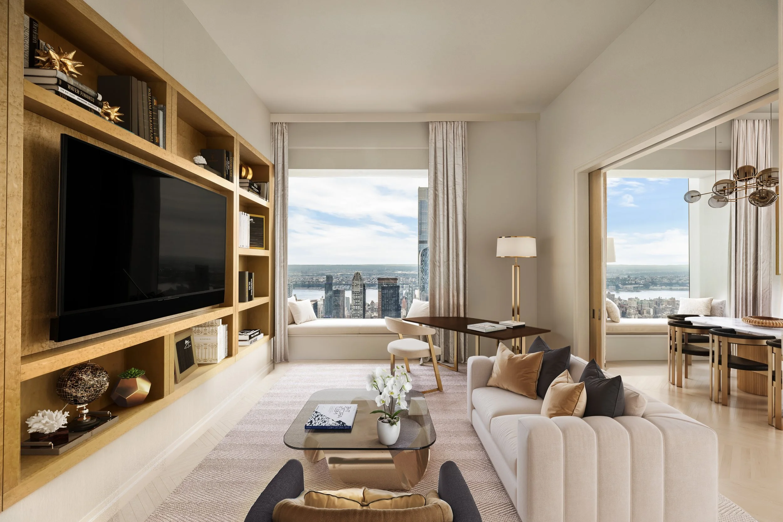 Modern living room with large window view of city skyline, white sofa with pillows, glass coffee table with a plant, and built-in shelving with decor.