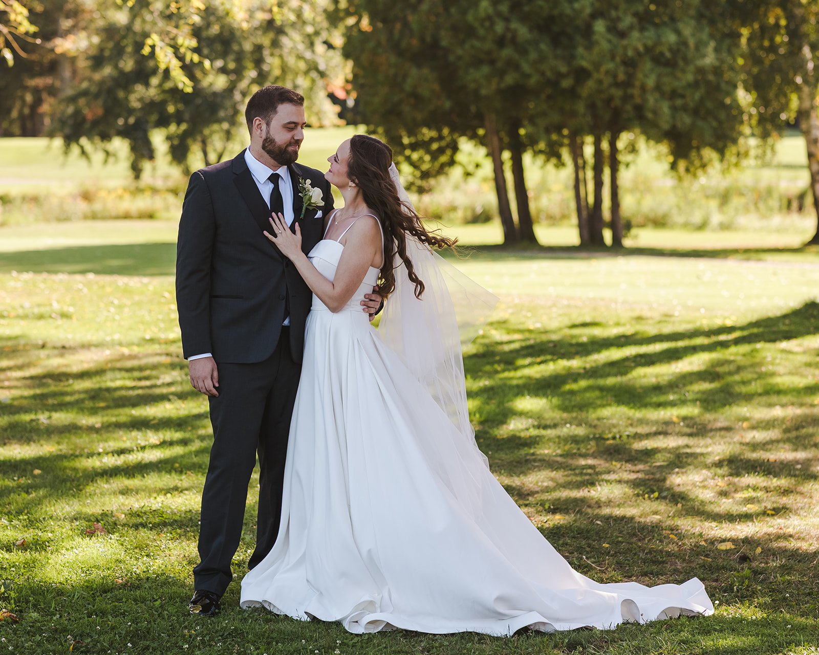 Bride and groom embrace Century Pines  Fedora Media.jpg