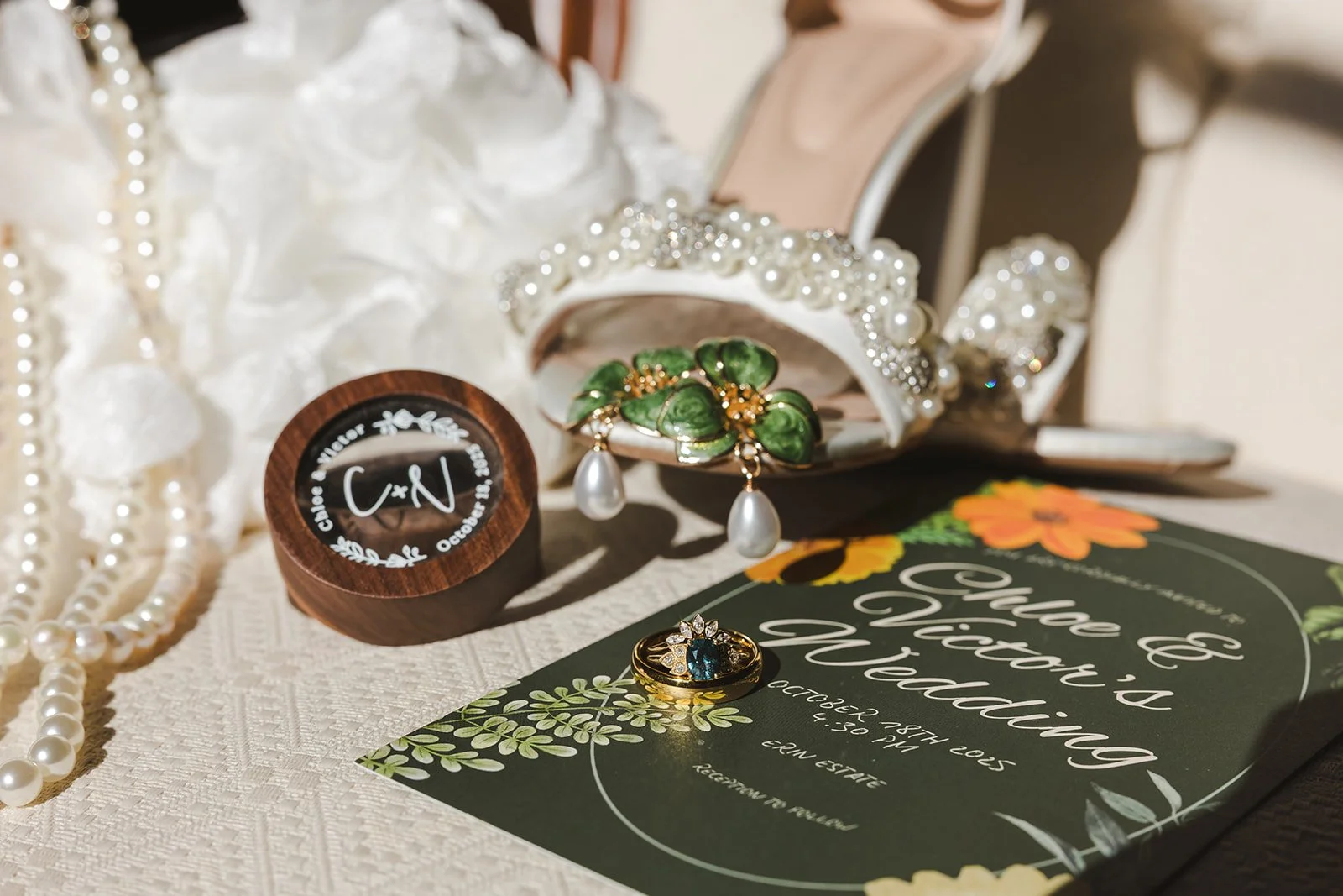 Wedding details rings and invitation  Erin Estates  Fedora Media.jpg