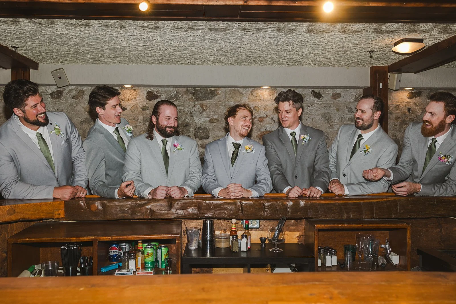 Groom and groomsmen at bar  River's Edge  Arlington Hotel  Paris, ON  Fedora Media.jpg