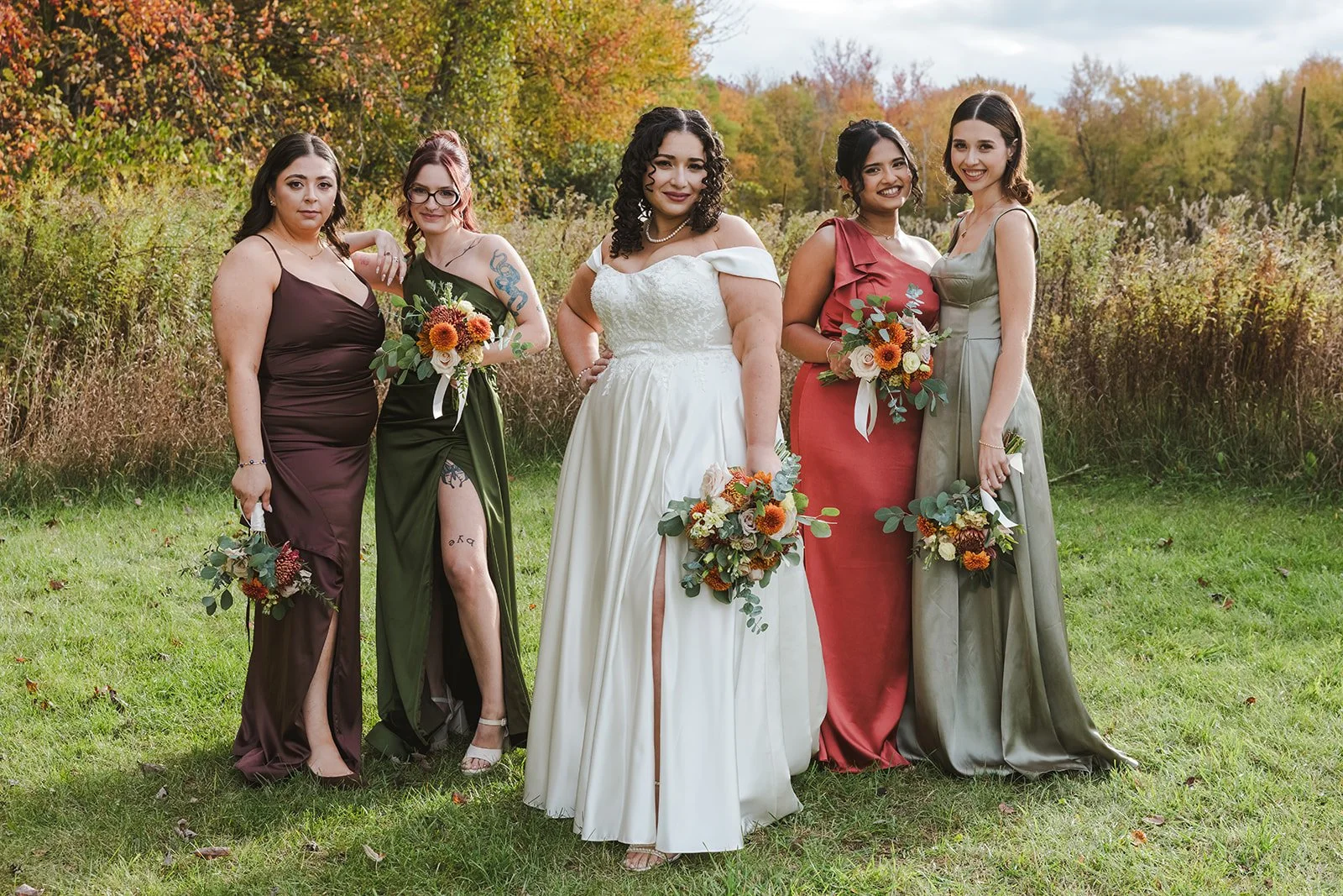 Bride editorially posed with braidesmaids  Cambridge Butterfly Conservatory  Cambridge, ON  Fedora Media.jpg
