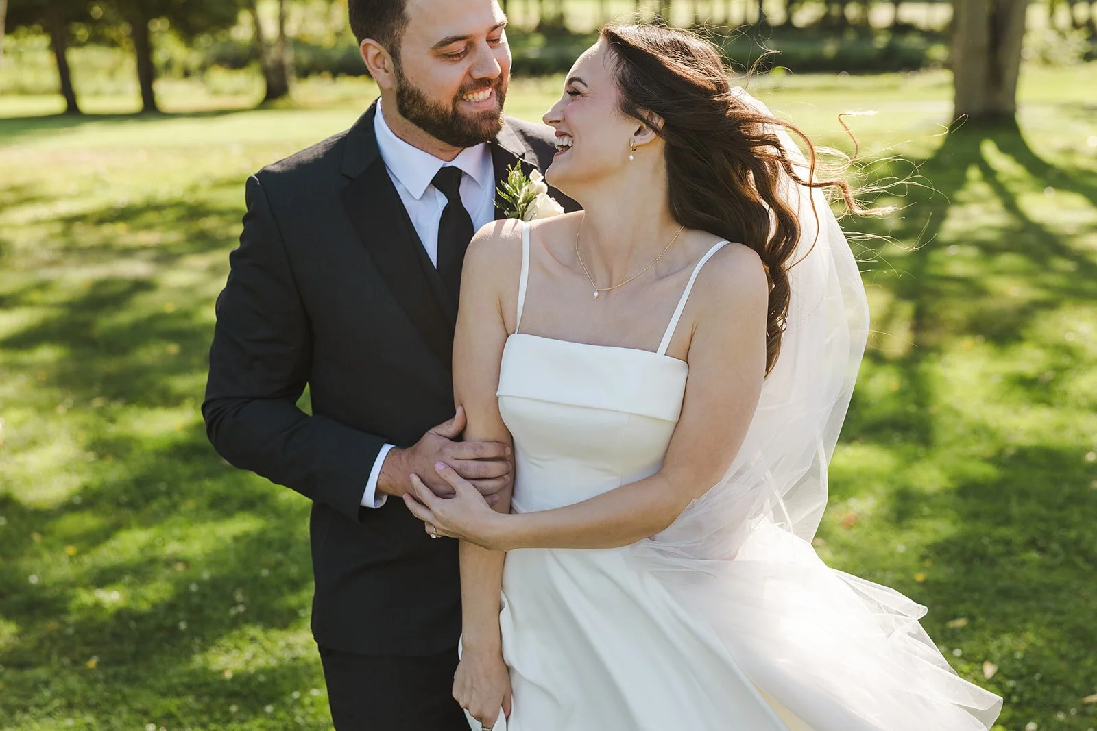 Groom holding brides arm Century Pines  Fedora Media.jpg