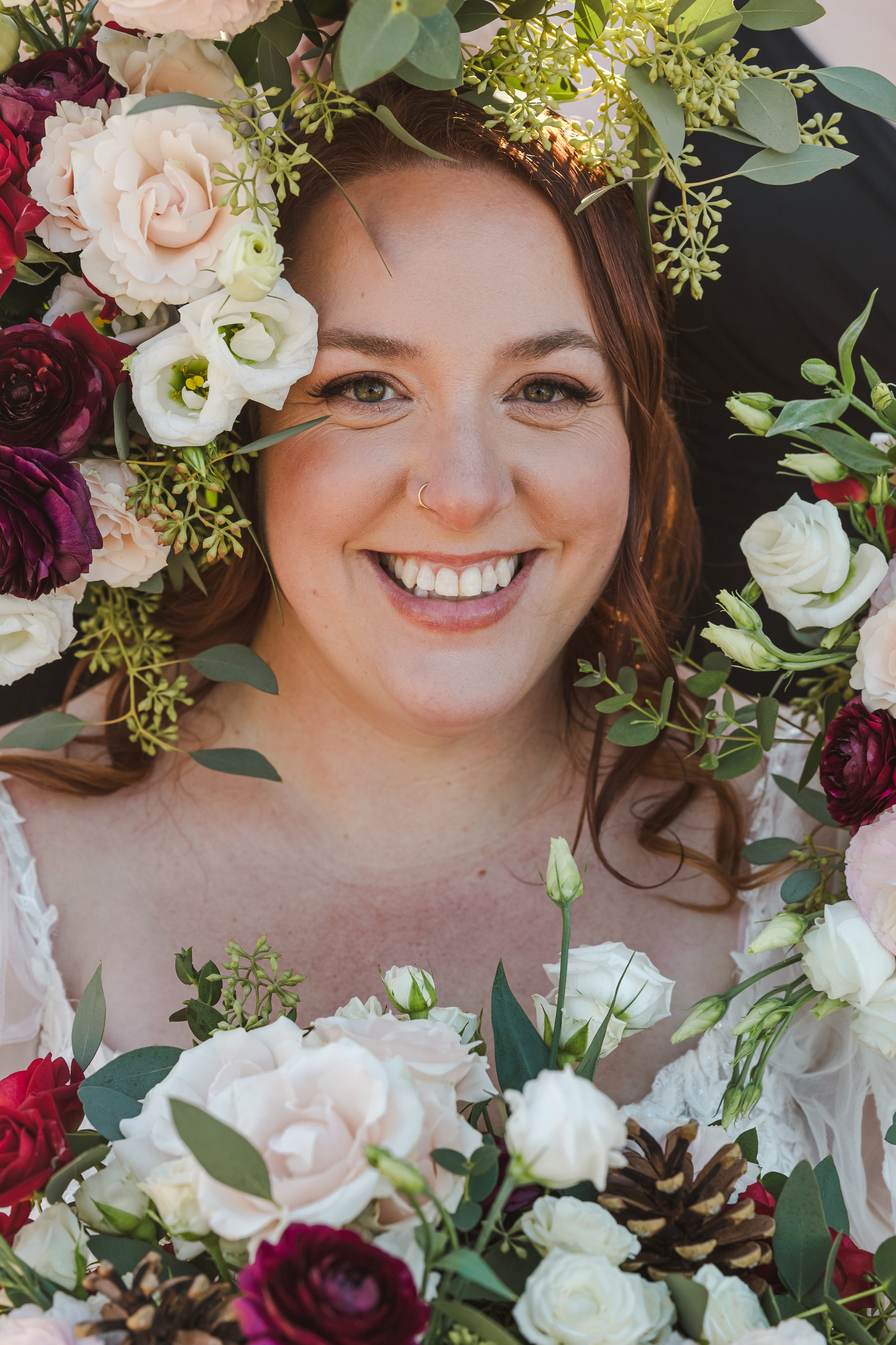 bride-surrounded-by-flowers-fedora-media.jpg