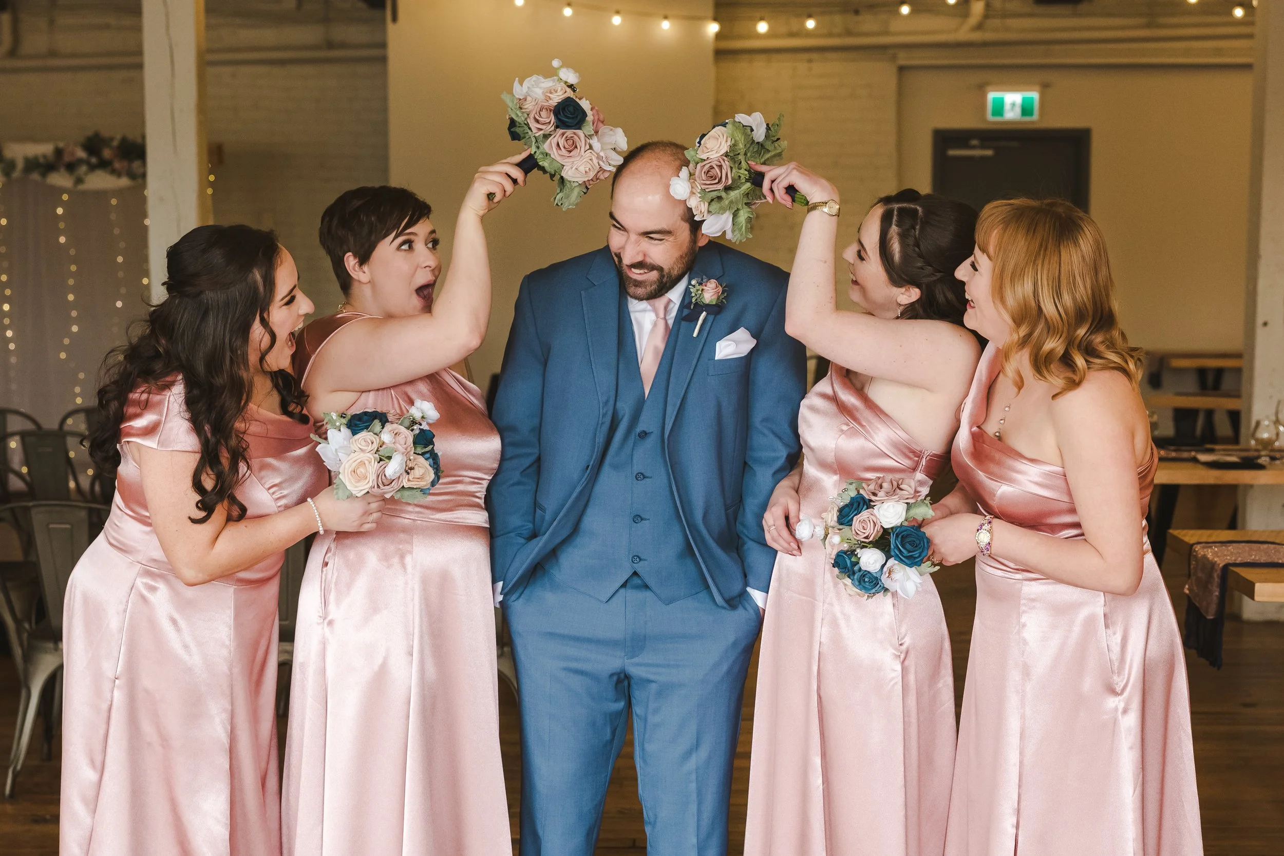 bridesmaaids-with-groom-fedora-media.jpg