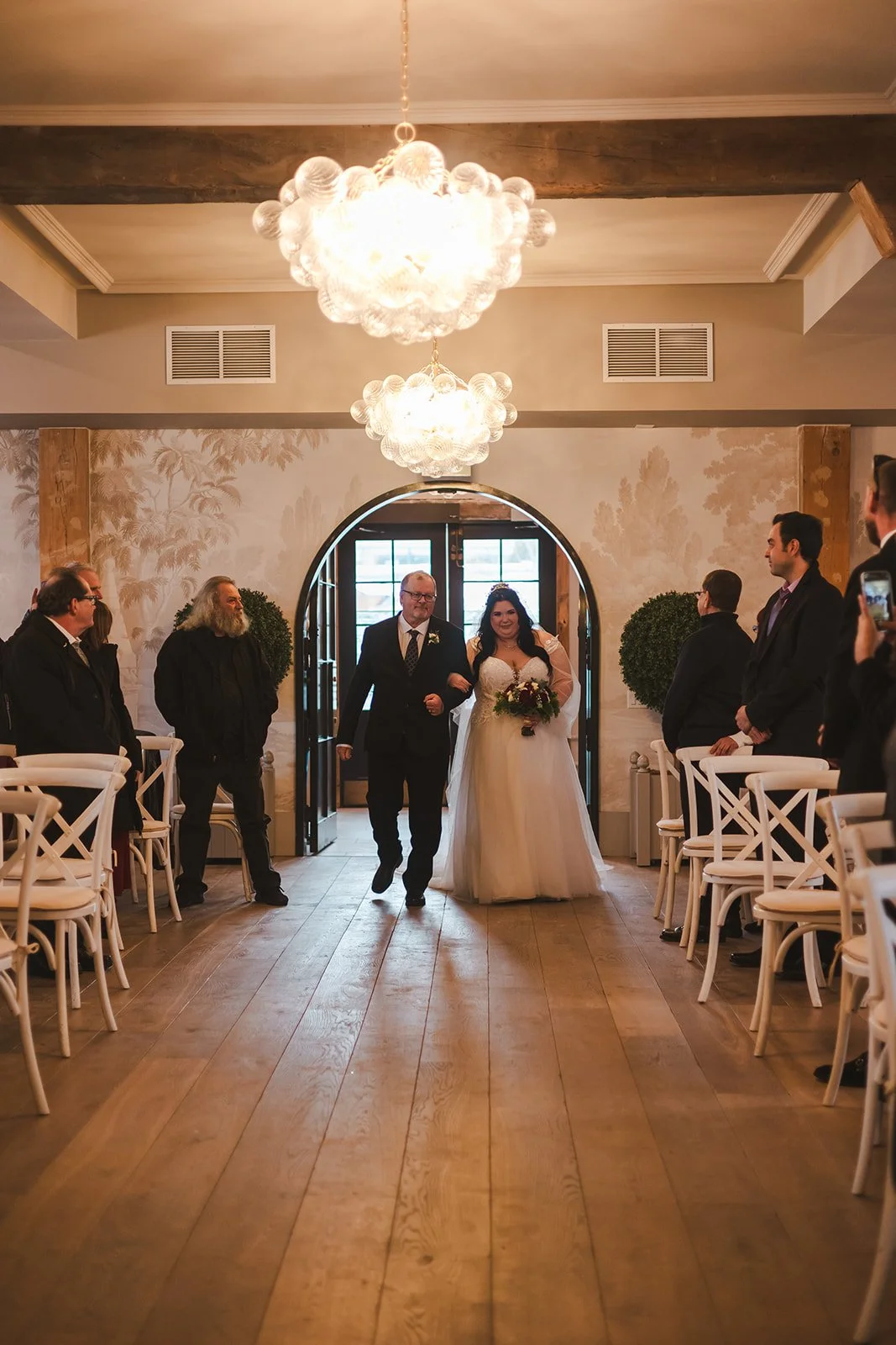 Bride and father walking down aisle  Elora Mill  Elora, ON  Fedora Media.jpg