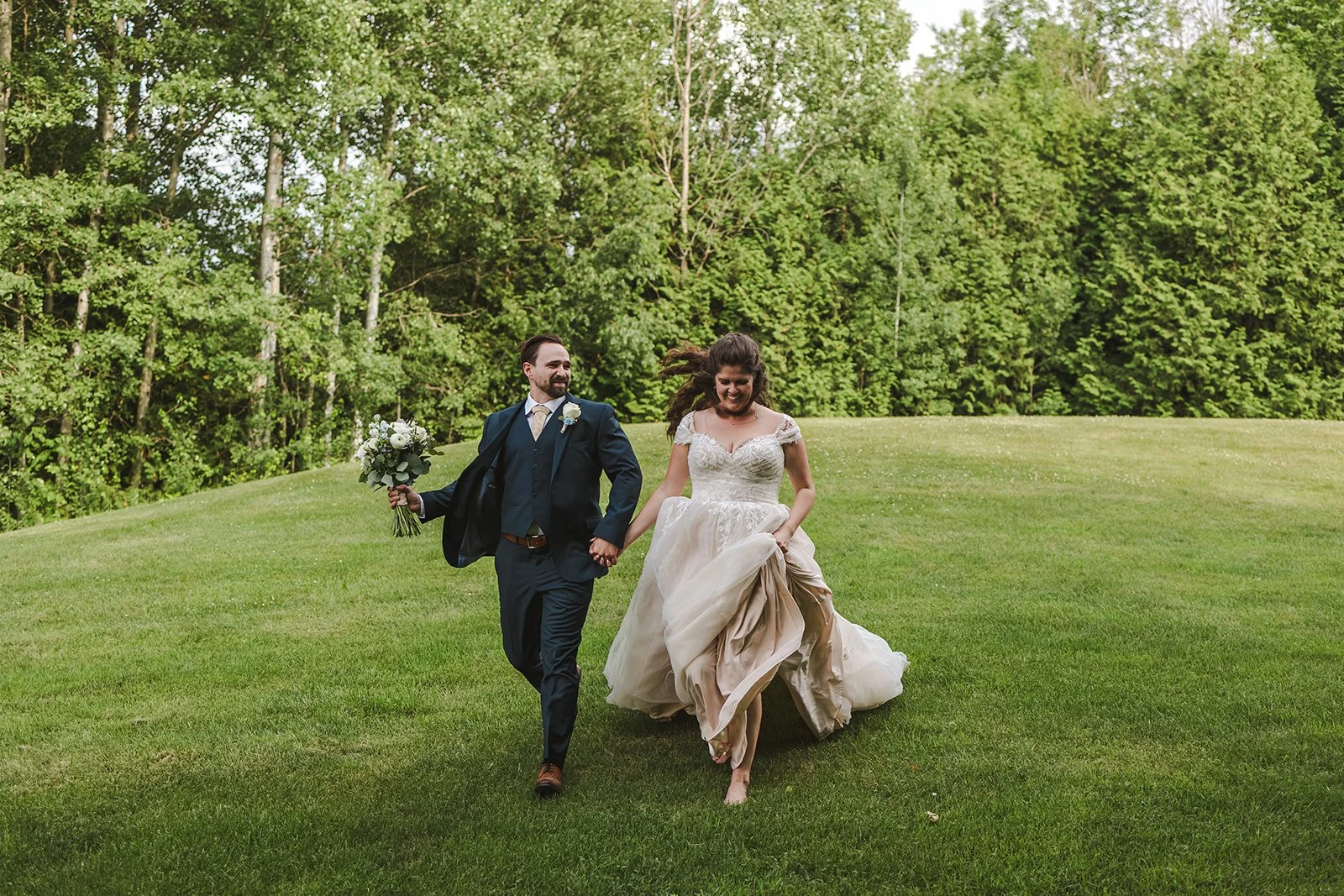 Bride and groom running  CJ Country events  Guelph, ON  Fedora Media.jpg