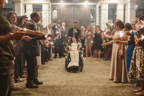 Bride+in+wheelchair+sparkler+send+off+at+Whistle+Bear+Golf+Course+photo+by+Fedora+Media.webp