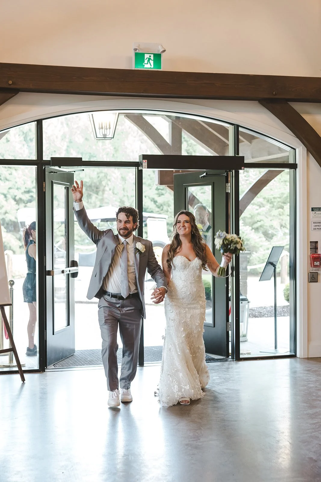 Bride and groom entering venue together  Erin Estates  Fedora Media.jpg