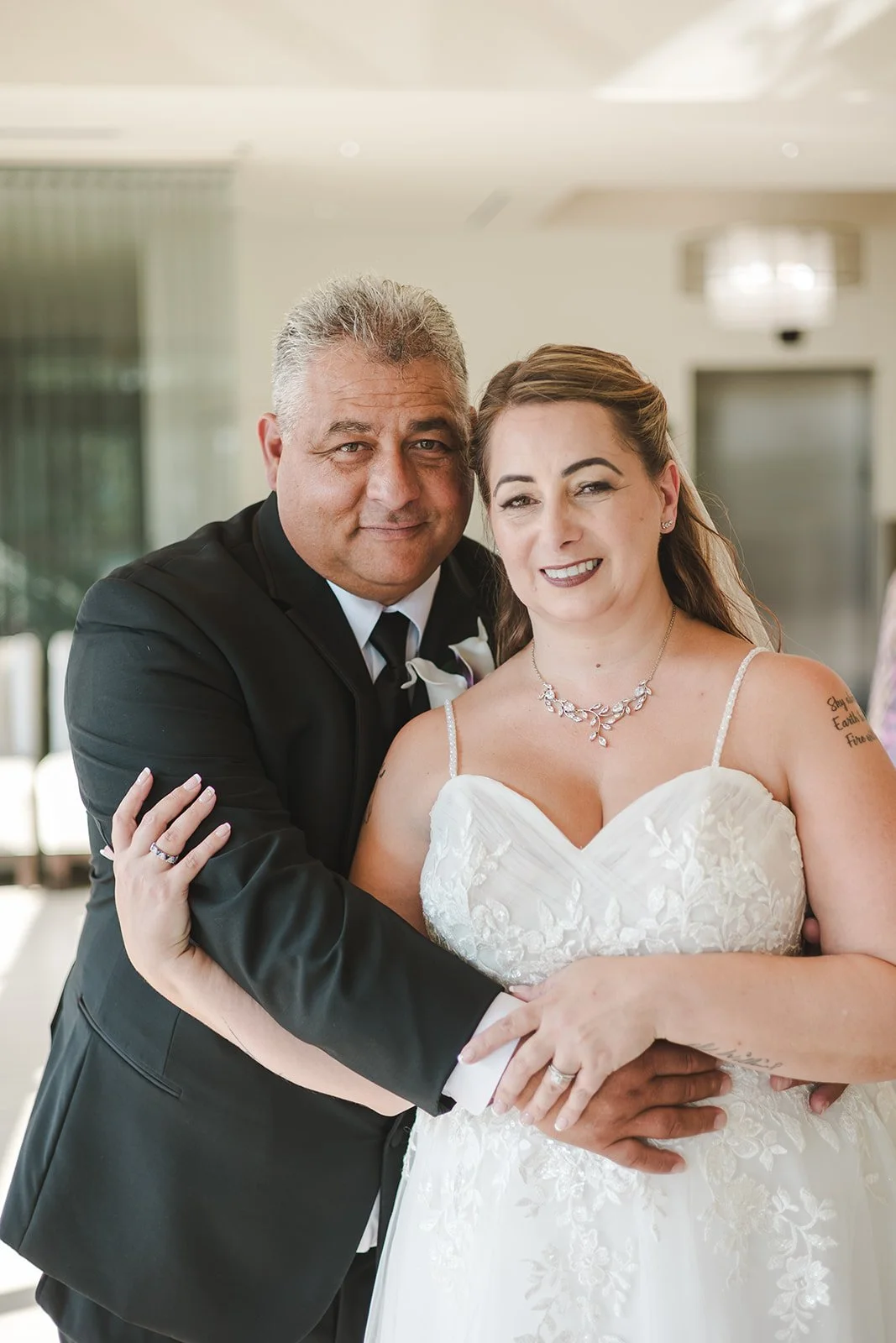 Bride and groom embrace  Hamilton, ON  Carmen's Hotel  Fedora Media.jpg