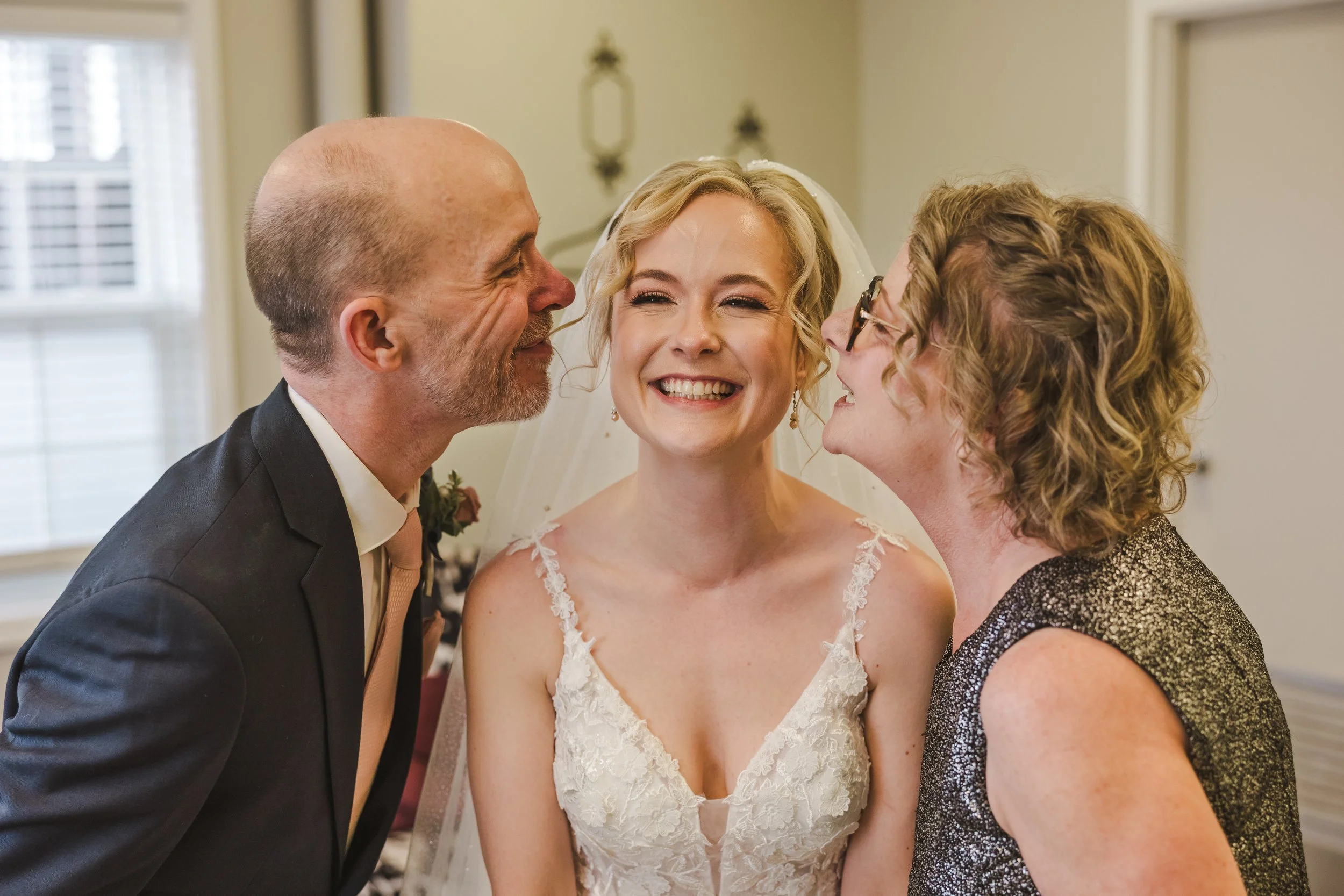 bride-with-parents-fedora-media.jpg