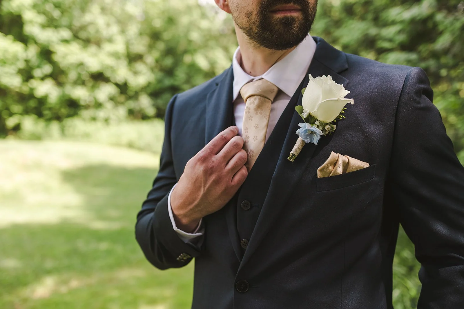 Close up of grooms suit  CJ Country events  Guelph, ON  Fedora Media.jpg