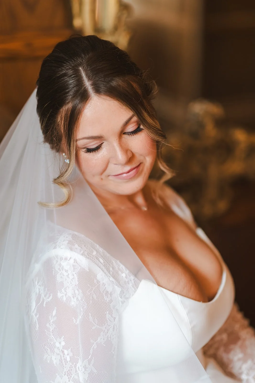 Bride in dress with veil pulled back  Erin Estates  Fedora Media.jpg