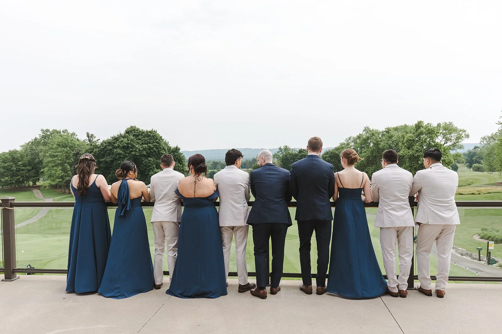 Wedding party overlooking balcony  Dundas Valley  Fedora Media.jpg
