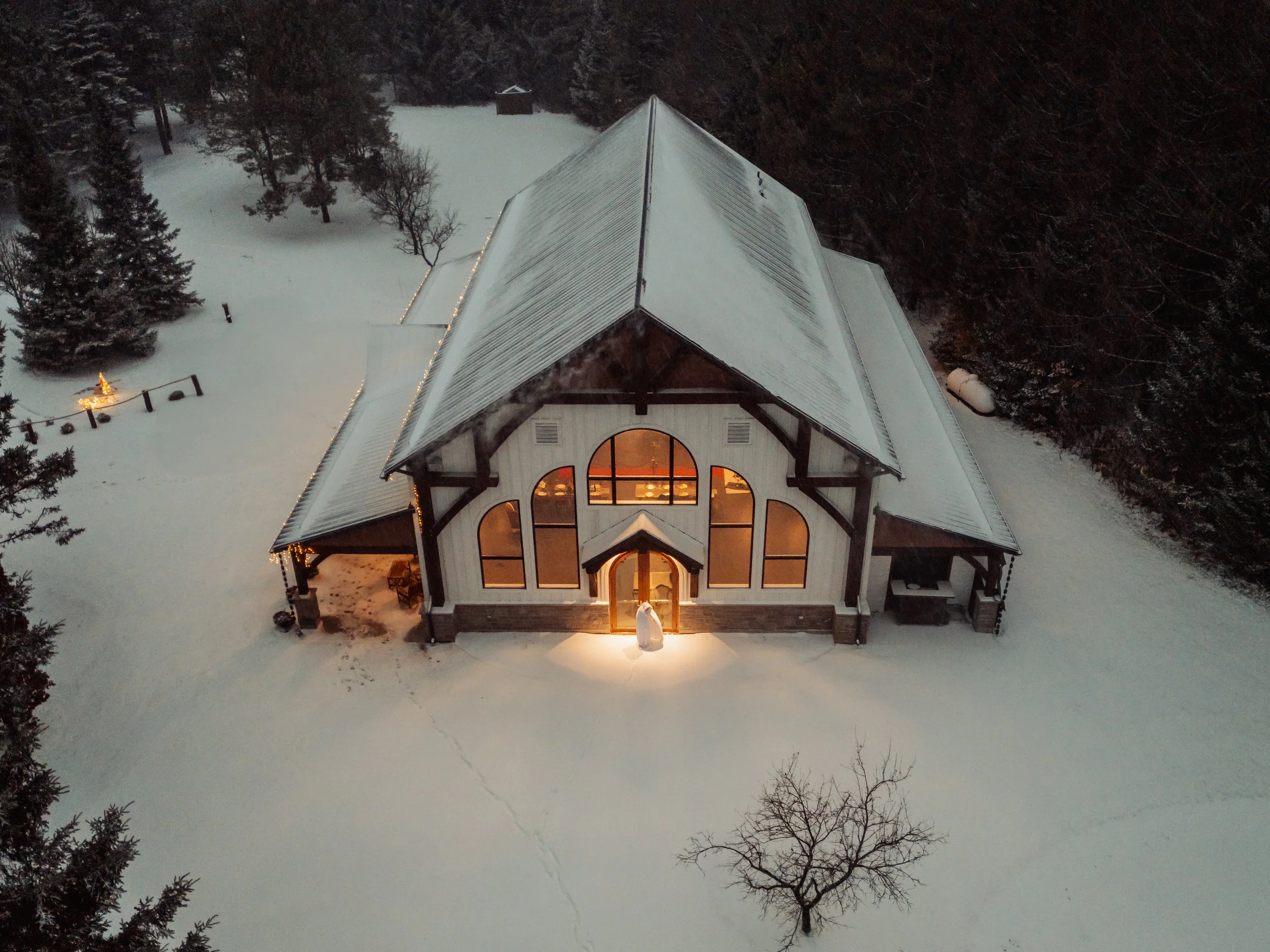 arial-view-of-erin-estate-in-winter-snow-fedora-media.jpg