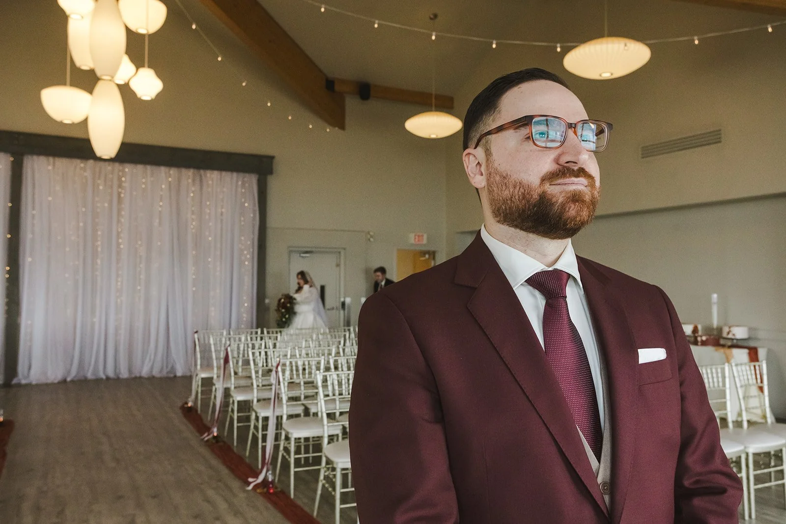 Groom facing altar as bride enters  Lakeview By Carmens  Hamilton, ON  Fedora Media.jpg