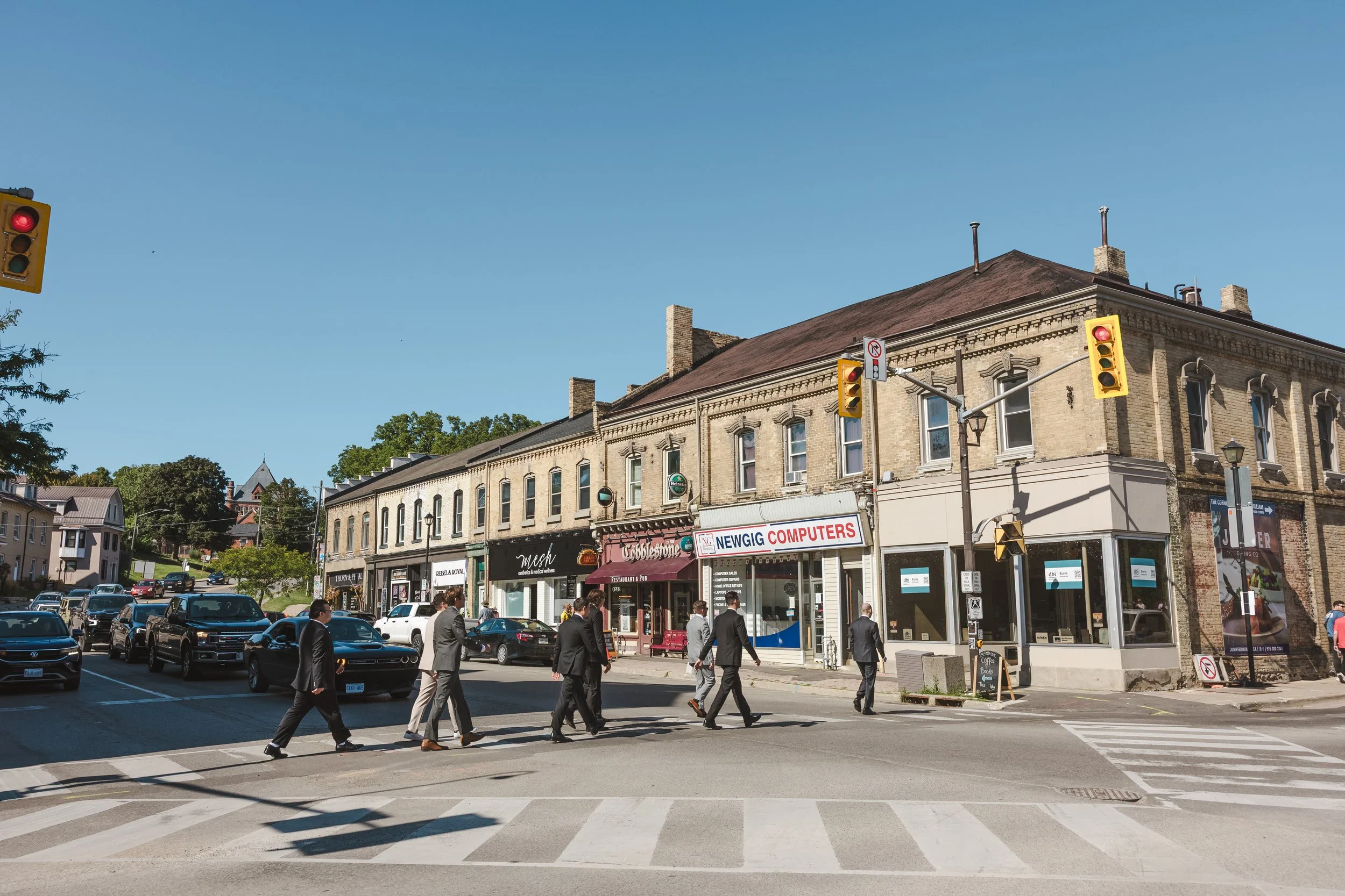 wedding-party-walking-across-street-fedora-media.jpg