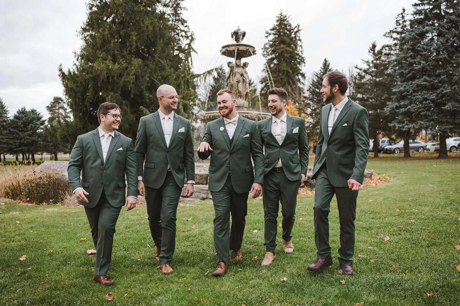 Groom walking with groomsmen  fall wedding  Fedora Media.jpg