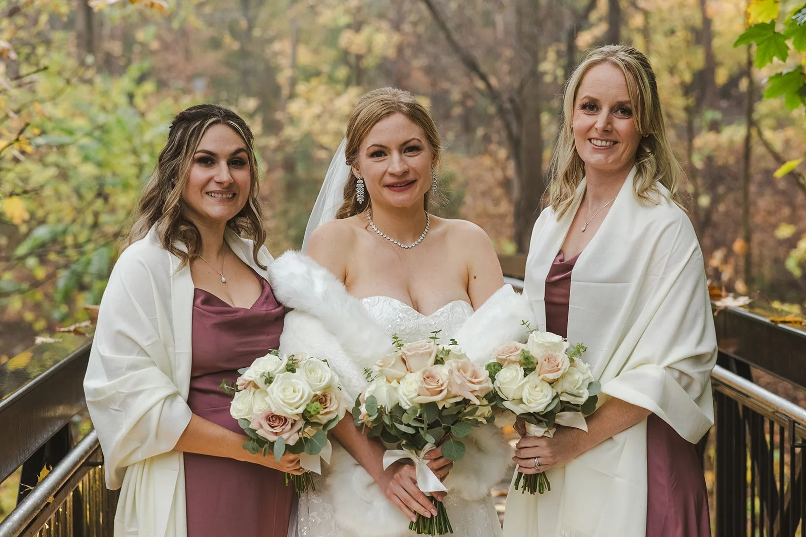 Bride with bridemaids on bridge  Ancaster,  ON  Ancaster Mill  Fedora Media.jpg