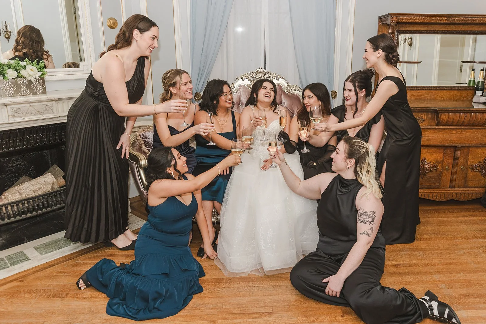 bride-with-bridemaids-surrounding-her-fedora-media.jpg
