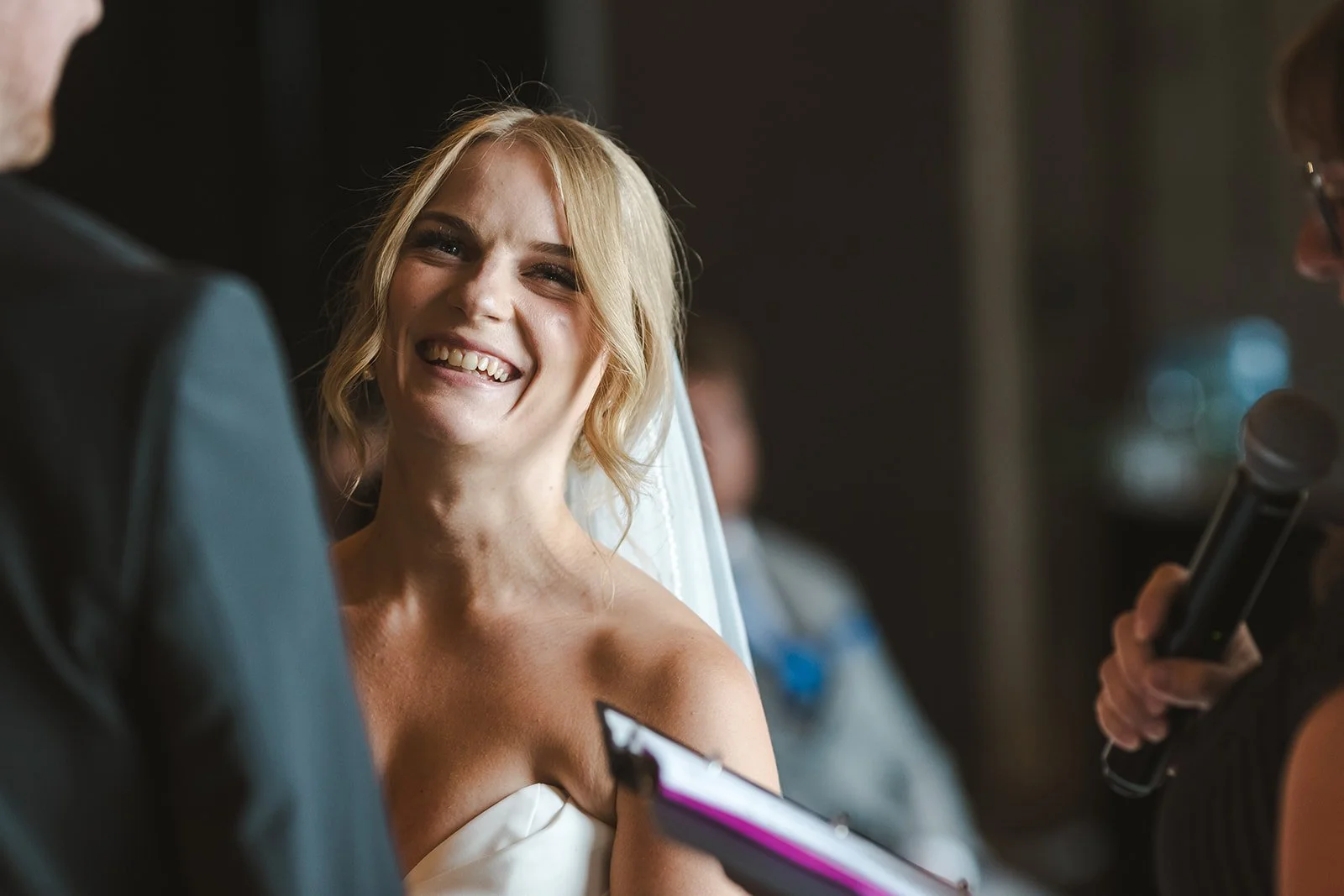 Bride candid laugh moment during wedding eremony  Straford, ON  Fedora Media.jpg