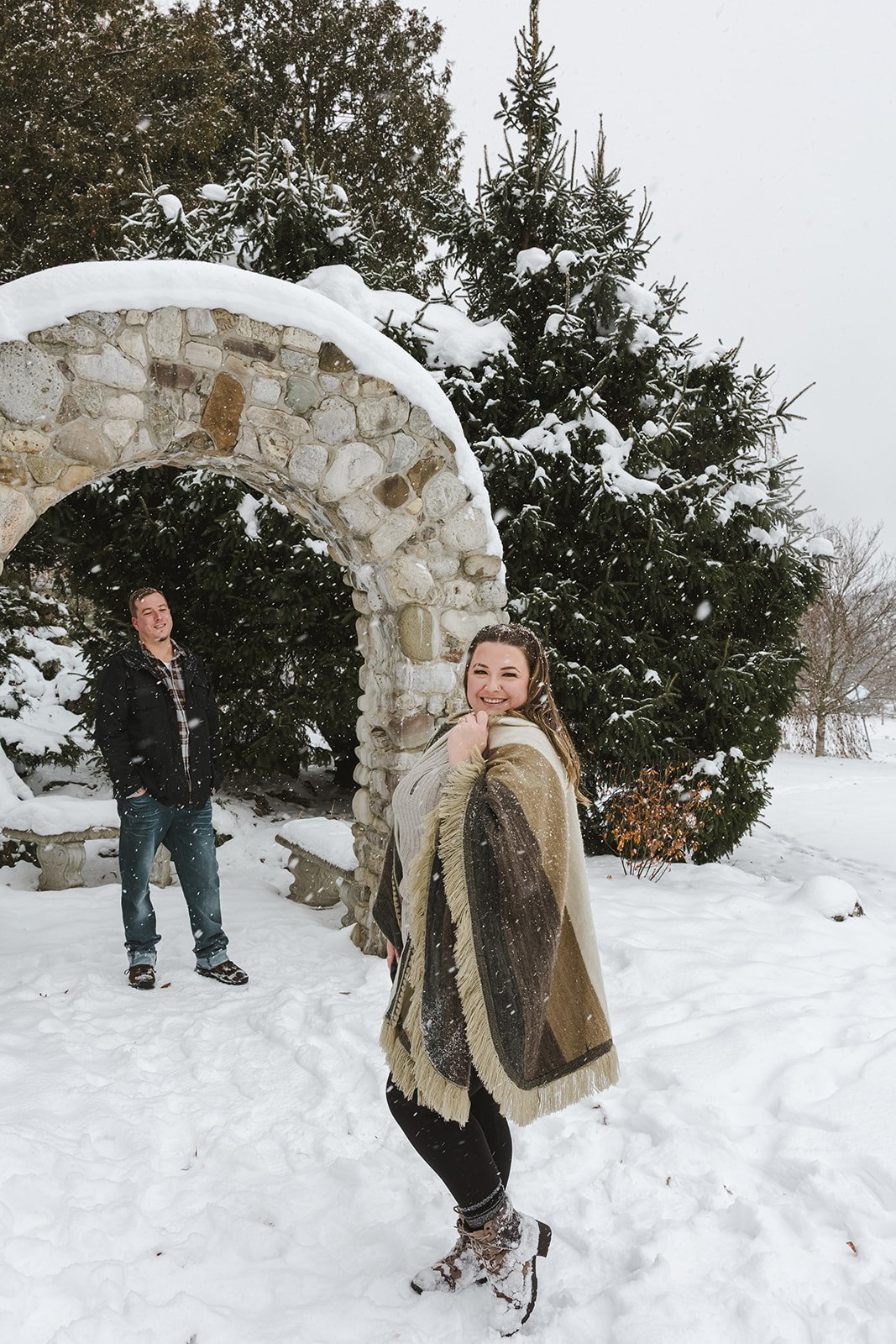 Man admiring woman as she smiles for camera  Ontario Engagement  Fedora Media.jpg