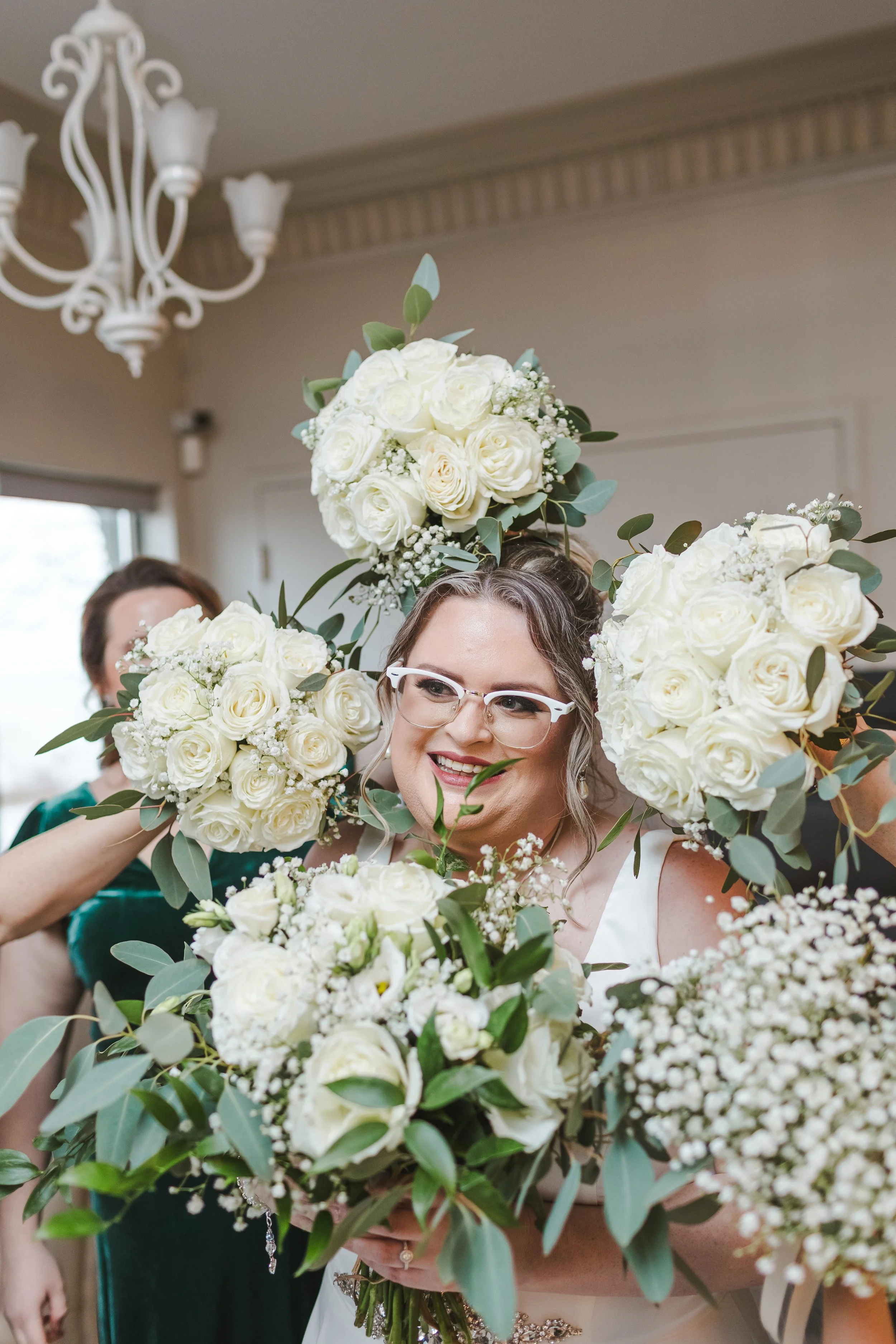 bride-surrounded-by-bouquets-fedora-media.jpg