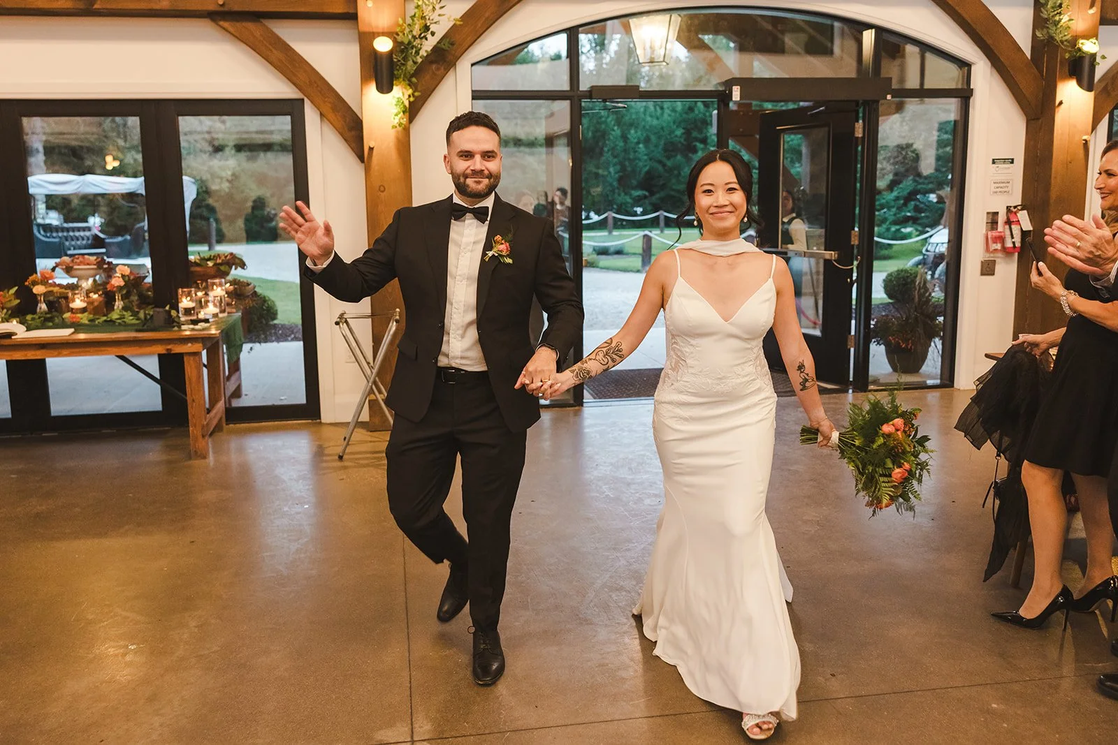 Bride and groom entering venue together  Erin Estates  Fedora Media.jpg